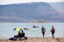 People sun themselves, jet ski, kayak and swim along Boulder Beach at Lake Mead on June 19, 202 ...